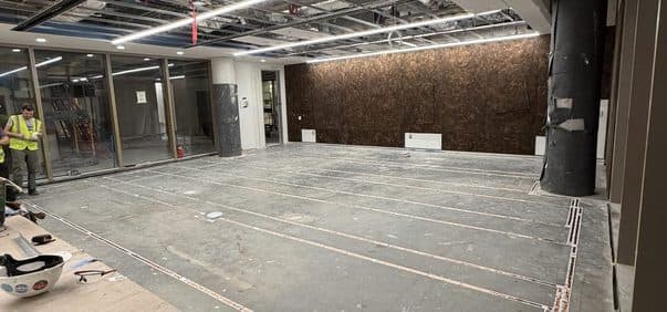 Full-room loop array on an open retail floor
