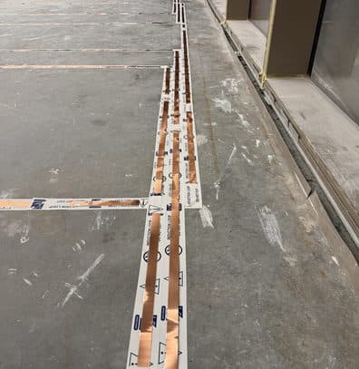 Flat-wire hearing loop before flooring