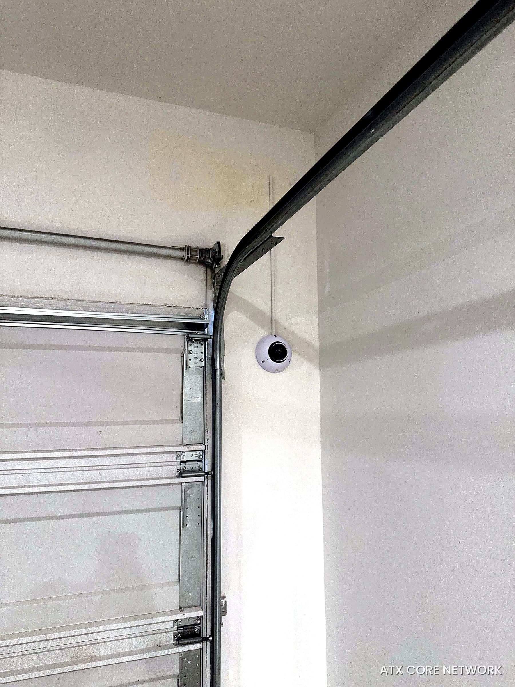 Interior dome camera covering a residential garage